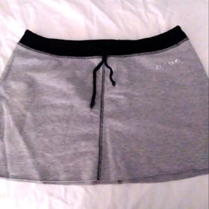 BeBe skirt size Medium gray with black band